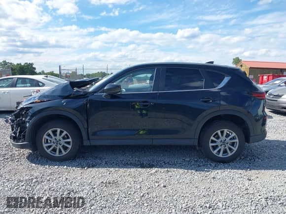 2023 Mazda CX-5 S Select with VIN JM3KFBBM9P0242998, listed as a IAAI auction lot 43071605 with 20,060 mi miles and . Bid and sale history available at DreamBid. Image 14.