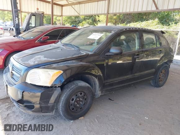 2008 Dodge Caliber SE with VIN 1B3HB28B08D645851, listed as a IAAI auction lot 43337769 with 283,019 mi miles and . Bid and sale history available at DreamBid. Image 2.
