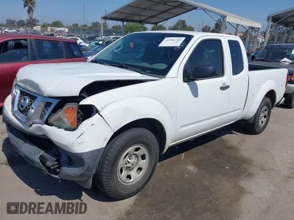 2014 Nissan Frontier S with VIN 1N6BD0CT2EN739140, listed as a IAAI auction lot 42386745 with 169,409 mi miles and . Bid and sale history available at DreamBid. Image 2.