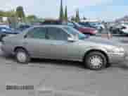 1998 Toyota Camry LE z VIN JT2BG22K5W0120831, wystawiony jako IAAI lot #43273319 z przebiegiem 197 465 mil mil oraz . Historia ofert i sprzedaży dostępna na DreamBid. Obrazek 13.