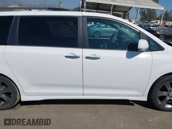 2016 Toyota Sienna SE with VIN 5TDXK3DC0GS702003, listed as a IAAI auction lot 41957604 with 41,409 mi miles and . Bid and sale history available at DreamBid. Image 14.