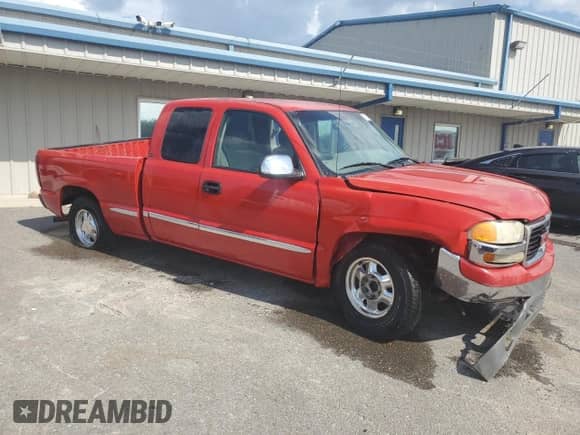 2000 GMC Sierra 1500 SLE with VIN 1GTEC19V2YZ311891, listed as a Copart auction lot 68736895 with 181,455 mi miles and Salvage title. Bid and sale history available at DreamBid. Image 4.
