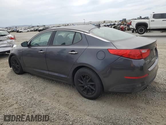 2015 Kia Optima LX с VIN KNAGM4A71F5642306, выставлен на аукционе Copart как лот 70604665 с пробегом 188 034 миль миль и Списание • Salvage title. История ставок и продаж доступна на DreamBid. Изображение 2.