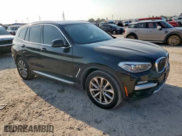 2018 BMW X3 xDrive30i с VIN 5UXTR9C57JLD59426, выставлен на аукционе Copart как лот 71511865 с пробегом 125 981 миль миль и Списание • Salvage title. История ставок и продаж доступна на DreamBid. Изображение 4.