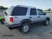 1995 Chevrolet Blazer z VIN 1GNDT13W6S2171395, wystawiony jako Copart lot #65632595 z przebiegiem 156 605 mil mil oraz Szkoda całkowita • Salvage title. Historia ofert i sprzedaży dostępna na DreamBid. Obrazek 3.