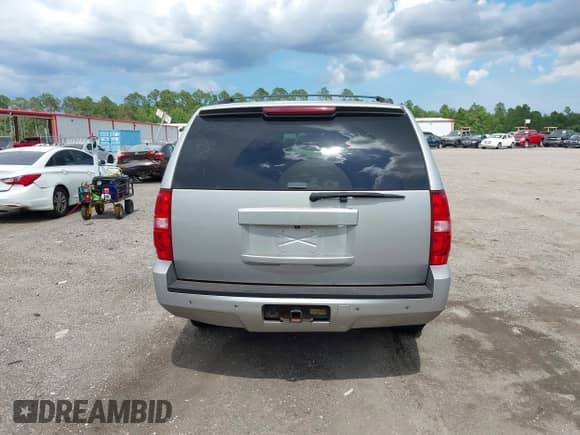 2011 Chevrolet Suburban LT with VIN 1GNSKJE39BR314960, listed as a IAAI auction lot 42697991 with 229,796 mi miles and . Bid and sale history available at DreamBid. Image 16.