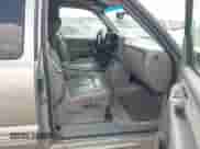 2002 Chevrolet Silverado 1500 LS with VIN 2GCEC19T221270290, listed as a IAAI auction lot 43084494 with 126,807 mi miles and . Bid and sale history available at DreamBid. Image 5.