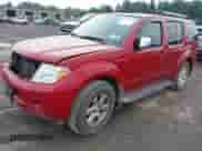 2012 Nissan Pathfinder SV with VIN 5N1AR1NB1CC633681, listed as a IAAI auction lot 42858437 with 153,974 mi miles and . Bid and sale history available at DreamBid. Image 2.