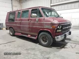 1992 Chevrolet Chevy Van z VIN 1GBEG25K9N7122995, wystawiony jako IAAI lot #42939853 z przebiegiem 140 765 mil mil oraz . Historia ofert i sprzedaży dostępna na DreamBid. Obrazek 1.