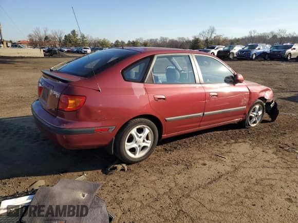 2003 Hyundai Elantra GT z VIN KMHDN55D03U090643, wystawiony jako Copart lot #48484415 z przebiegiem 85 424 mil mil oraz Szkoda całkowita • Salvage title. Historia ofert i sprzedaży dostępna na DreamBid. Obrazek 3.