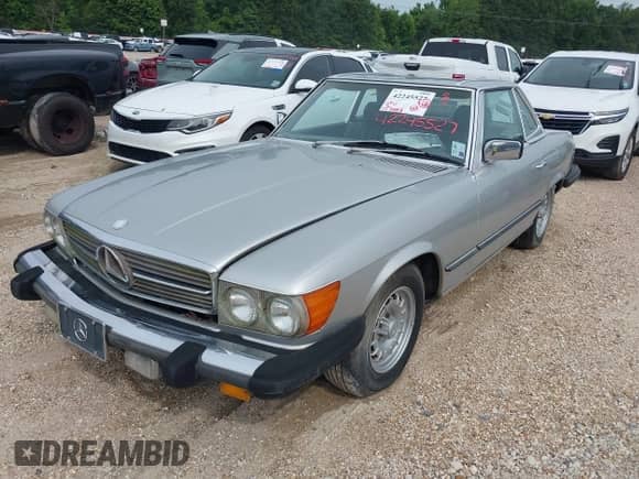 1985 Mercedes-Benz 380 with VIN WDBBA45C4FA016168, listed as a IAAI auction lot 42245527 with 127,083 mi miles and . Bid and sale history available at DreamBid. Image 2.
