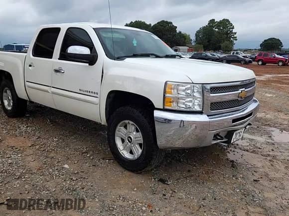 2013 Chevrolet Silverado 1500 LT с VIN 3GCPKSE77DG167838, выставлен на аукционе Copart как лот 84030425 с пробегом 182 220 миль миль и Списание • Salvage title. История ставок и продаж доступна на DreamBid. Изображение 13.