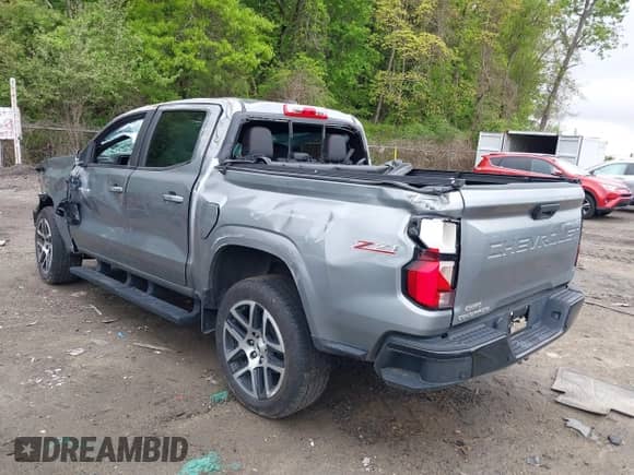 2023 Chevrolet Colorado 4WD Z71 with VIN 1GCPTDEK5P1245985, listed as a IAAI auction lot 42257455 with 48,708 mi miles and . Bid and sale history available at DreamBid. Image 3.