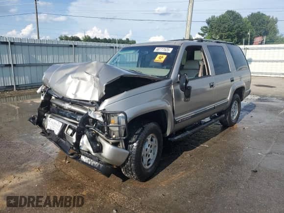 2000 Chevrolet Tahoe Z71 с VIN 1GNEK13R9YR174809, выставлен на аукционе Copart как лот 68777525 с пробегом Не указан миль и Списание • Salvage title. История ставок и продаж доступна на DreamBid. Изображение 1.
