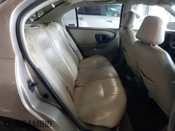 2000 Chevrolet Malibu LS z VIN 1G1NE52J9Y6326326, wystawiony jako Copart lot #72615584 z przebiegiem 235 408 mil mil oraz Szkoda całkowita • Salvage title. Historia ofert i sprzedaży dostępna na DreamBid. Obrazek 10.