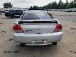 2006 Hyundai Tiburon GS с VIN KMHHM65D66U226482, выставлен на аукционе Copart как лот 64059334 с пробегом 93 932 миль миль и Списание • Salvage title. История ставок и продаж доступна на DreamBid. Изображение 6.