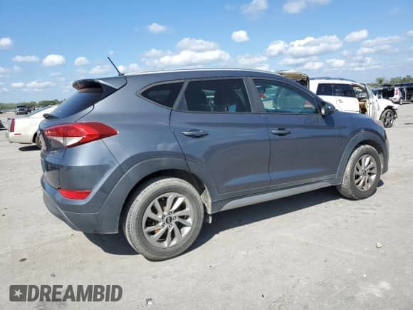 2017 Hyundai Tucson SE z VIN KM8J33A42HU374057, wystawiony jako Copart lot #84389295 z przebiegiem 153 668 mil mil oraz Czysty tytuł • Clean title. Historia ofert i sprzedaży dostępna na DreamBid. Obrazek 3.
