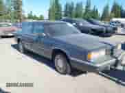 1990 Dodge Dynasty with VIN 1B3XC4639LD800339, listed as a IAAI auction lot 42624306 with 66,804 mi miles and . Bid and sale history available at DreamBid. Image 1.