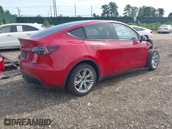 2022 Tesla Model Y Long Range z VIN 7SAYGAEE3NF484623, wystawiony jako IAAI lot #42982060 z przebiegiem 29 313 mil mil oraz . Historia ofert i sprzedaży dostępna na DreamBid. Obrazek 4.