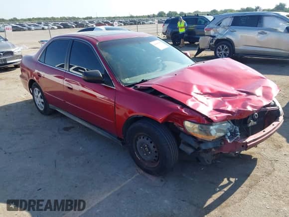 2002 Honda Accord SE z VIN 1HGCG66862A077088, wystawiony jako IAAI lot #43005506 z przebiegiem 183 261 mil mil oraz . Historia ofert i sprzedaży dostępna na DreamBid. Obrazek 1.