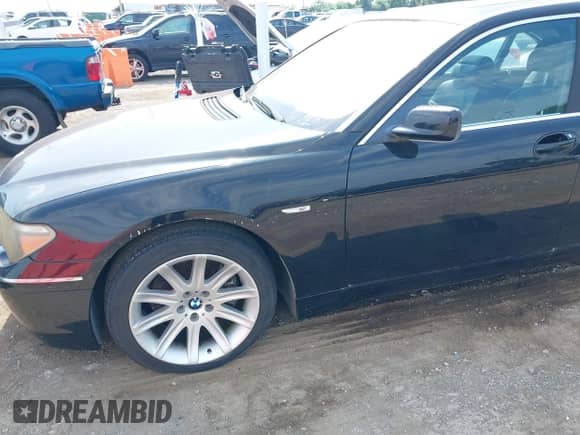 2004 BMW 7 Series 745Li with VIN WBAGN63464DS51067, listed as a IAAI auction lot 42681232 with 125,088 mi miles and . Bid and sale history available at DreamBid. Image 6.