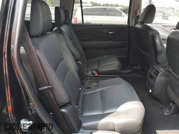 2022 Honda Pilot Elite z VIN 5FNYF6H06NB042898, wystawiony jako Copart lot #65319895 z przebiegiem 66 568 mil mil oraz Szkoda całkowita • Salvage title. Historia ofert i sprzedaży dostępna na DreamBid. Obrazek 11.