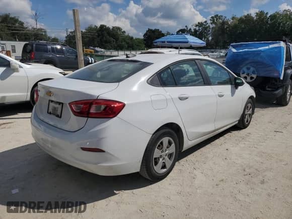 2018 Chevrolet Cruze LS с VIN 1G1BC5SM3J7136167, выставлен на аукционе Copart как лот 81872085 с пробегом 130 419 миль миль и Списание • Salvage title. История ставок и продаж доступна на DreamBid. Изображение 3.