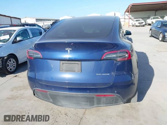 2022 Tesla Model Y Long Range z VIN 7SAYGDEE9NF443673, wystawiony jako IAAI lot #42878246 z przebiegiem 65 689 mil mil oraz . Historia ofert i sprzedaży dostępna na DreamBid. Obrazek 16.