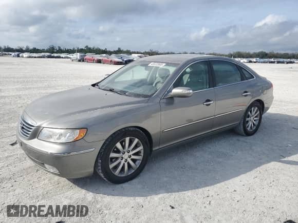 2009 Hyundai Azera Limited с VIN KMHFC46FX9A373084, выставлен на аукционе Copart как лот 45532865 с пробегом 107 592 миль миль и Списание • Salvage title. История ставок и продаж доступна на DreamBid. Изображение 1.