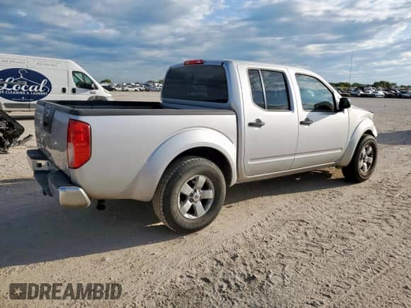 2010 Nissan Frontier SE with VIN 1N6AD0ER5AC429034, listed as a Copart auction lot 81740205 with 83,612 mi miles and Salvage title. Bid and sale history available at DreamBid. Image 3.