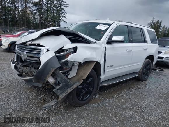 2017 Chevrolet Tahoe Premier with VIN 1GNSKCKC6HR157509, listed as a IAAI auction lot 41925981 with 164,656 mi miles and . Bid and sale history available at DreamBid. Image 16.