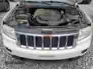 2011 Jeep Grand Cherokee 70th Anniversary z VIN 1J4RR4GG1BC654864, wystawiony jako Copart lot #60736355 z przebiegiem 149 219 mil mil oraz Czysty tytuł • Clean title. Historia ofert i sprzedaży dostępna na DreamBid. Obrazek 12.