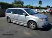 2010 Dodge Grand Caravan SXT with VIN 2D4RN5D10AR130721, listed as a Copart auction lot 80635825 with 199,299 mi miles and Salvage title. Bid and sale history available at DreamBid. Image 4.