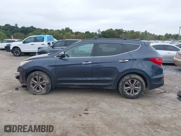 2014 Hyundai Santa Fe z VIN 5XYZU3LB0EG151660, wystawiony jako IAAI lot #43270298 z przebiegiem 121 272 mil mil oraz . Historia ofert i sprzedaży dostępna na DreamBid. Obrazek 14.