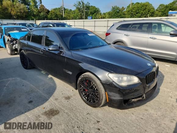 2013 BMW 7 Series 750Li с VIN WBAYE8C51DDE22061, выставлен на аукционе Copart как лот 63578755 с пробегом 137 192 миль миль и Списание • Salvage title. История ставок и продаж доступна на DreamBid. Изображение 4.