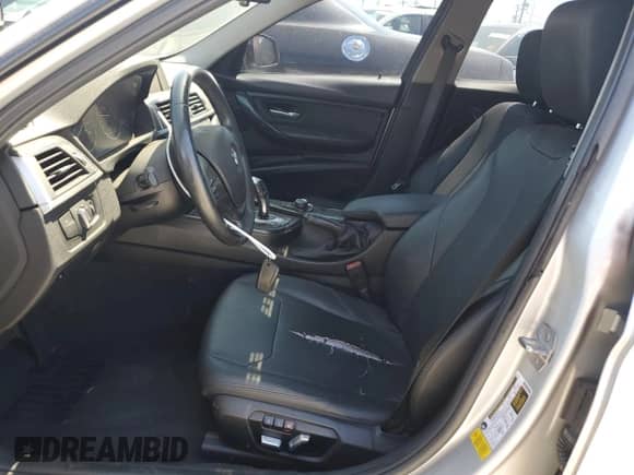 2018 BMW 3 Series 320i with VIN WBA8A9C50JAH13343, listed as a Copart auction lot 70562555 with 110,990 mi miles and Salvage title. Bid and sale history available at DreamBid. Image 7.