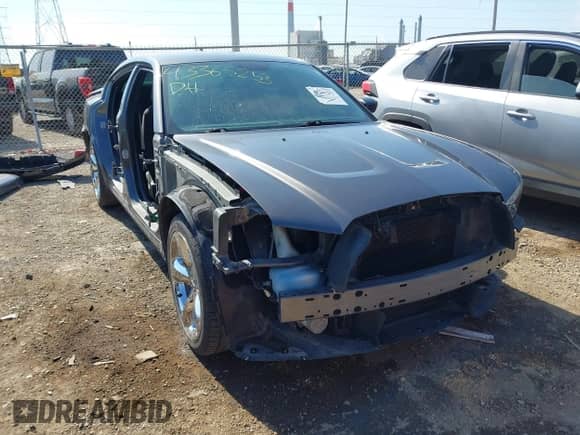 2014 Dodge Charger SE with VIN 2C3CDXBG2EH364318, listed as a IAAI auction lot 43365253 with 105,597 mi miles and . Bid and sale history available at DreamBid. Image 1.