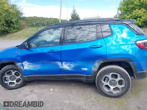 2022 Jeep Compass Trailhawk z VIN 3C4NJDDB4NT208902, wystawiony jako IAAI lot #43244688 z przebiegiem 16 647 mil mil oraz . Historia ofert i sprzedaży dostępna na DreamBid. Obrazek 15.