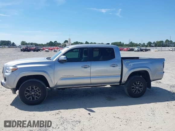 2022 Toyota Tacoma SR z VIN 3TYCZ5AN3NT091901, wystawiony jako IAAI lot #43203869 z przebiegiem 29 572 mil mil oraz . Historia ofert i sprzedaży dostępna na DreamBid. Obrazek 15.