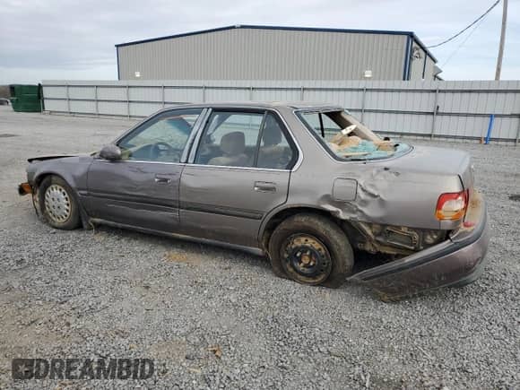 1993 Honda Accord LX с VIN 1HGCB7551PA000969, выставлен на аукционе Copart как лот 78876294 с пробегом 281 594 миль миль и Списание • Salvage title. История ставок и продаж доступна на DreamBid. Изображение 2.