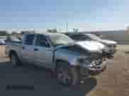 2008 Dodge Dakota Laramie with VIN 1D7HW58N18S634745, listed as a Copart auction lot 84002575 with 69,717 mi miles and Salvage title. Bid and sale history available at DreamBid. Image 4.