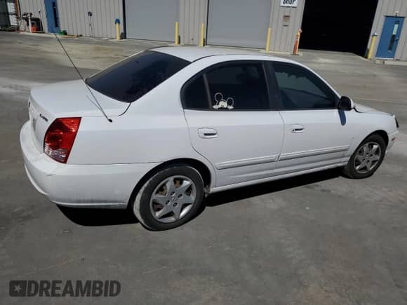 2005 Hyundai Elantra GLS z VIN KMHDN46D35U126174, wystawiony jako Copart lot #69844444 z przebiegiem Nie podano mil oraz Szkoda całkowita • Salvage title. Historia ofert i sprzedaży dostępna na DreamBid. Obrazek 3.