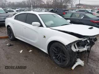 2021 Dodge Charger Scat Pack Widebody with VIN 2C3CDXGJ4MH527764, listed as a IAAI auction lot 41555871 with Not provided miles and . Bid and sale history available at DreamBid. Image 1.