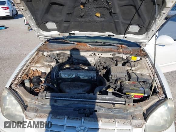 2001 Hyundai Sonata with VIN KMHWF25S41A403128, listed as a IAAI auction lot 43554850 with 212,602 mi miles and . Bid and sale history available at DreamBid. Image 10.