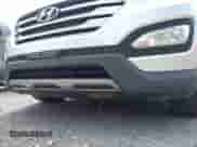 2013 Hyundai Santa Fe Sport z VIN 5XYZWDLA1DG044574, wystawiony jako IAAI lot #42727884 z przebiegiem 168 599 mil mil oraz . Historia ofert i sprzedaży dostępna na DreamBid. Obrazek 19.