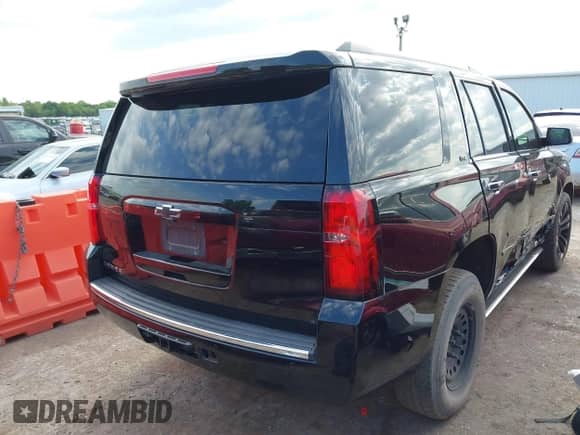2016 Chevrolet Tahoe LTZ with VIN 1GNSCCKC7GR144120, listed as a IAAI auction lot 42303641 with 126,196 mi miles and . Bid and sale history available at DreamBid. Image 4.