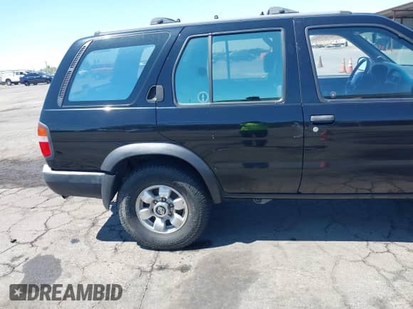 1999 Nissan Pathfinder XE z VIN JN8AR05Y4XW321446, wystawiony jako IAAI lot #42689685 z przebiegiem 184 918 mil mil oraz . Historia ofert i sprzedaży dostępna na DreamBid. Obrazek 17.