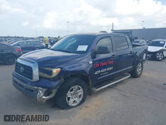 2007 Toyota Tundra SR5 z VIN 5TBET54107S454598, wystawiony jako IAAI lot #42558681 z przebiegiem 309 838 mil mil oraz . Historia ofert i sprzedaży dostępna na DreamBid. Obrazek 21.