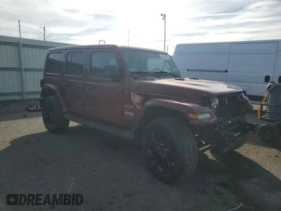 2021 Jeep Wrangler Unlimited Sahara with VIN 1C4JJXP6XMW704746, listed as a Copart auction lot 82208255 with 51,766 mi miles and Salvage title. Bid and sale history available at DreamBid. Image 4.