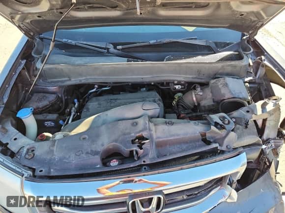 2014 Honda Pilot EX-L z VIN 5FNYF4H55EB054900, wystawiony jako Copart lot #82346645 z przebiegiem 158 454 mil mil oraz Szkoda całkowita • Salvage title. Historia ofert i sprzedaży dostępna na DreamBid. Obrazek 12.